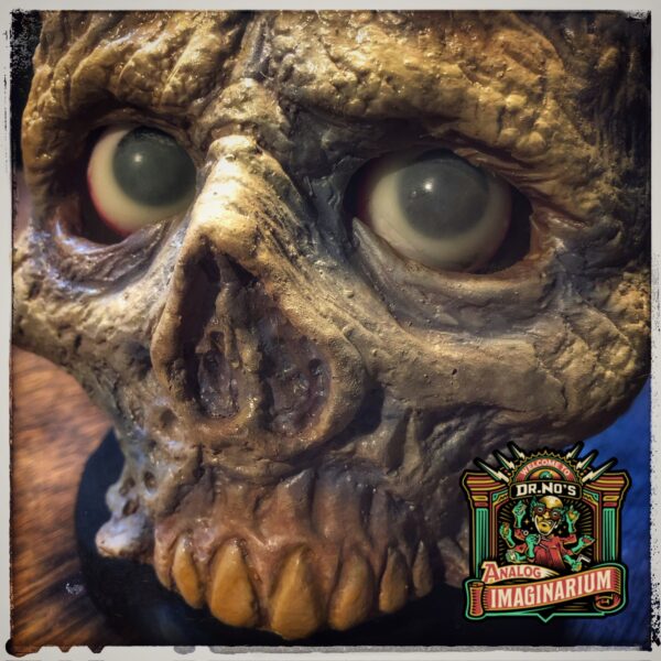 Fuzzadelic Skullshow by Dr. No Effects Zombie Skull by Cody Snyder.